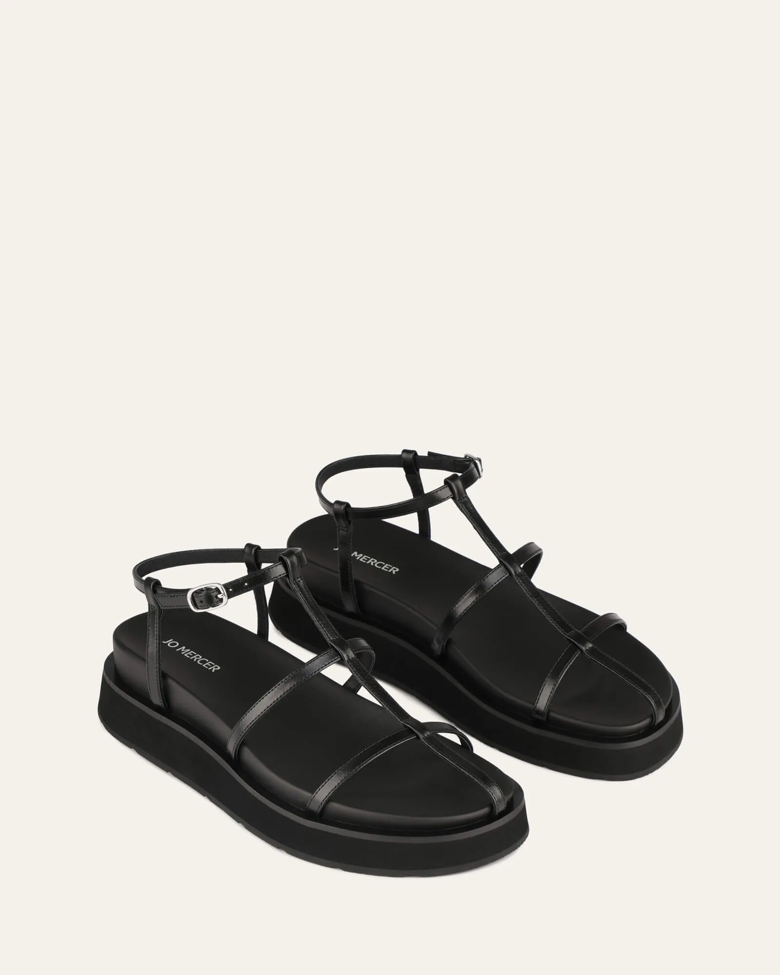 SANDALES PLATES MINA EN CUIR NOIR