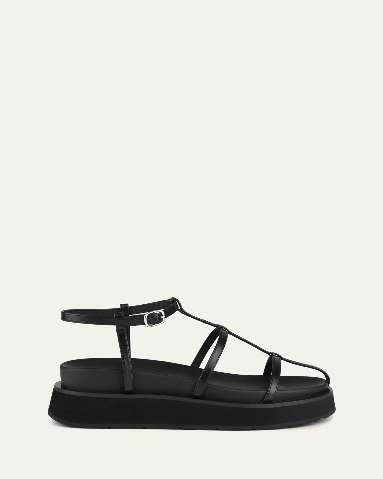 SANDALES PLATES MINA EN CUIR NOIR