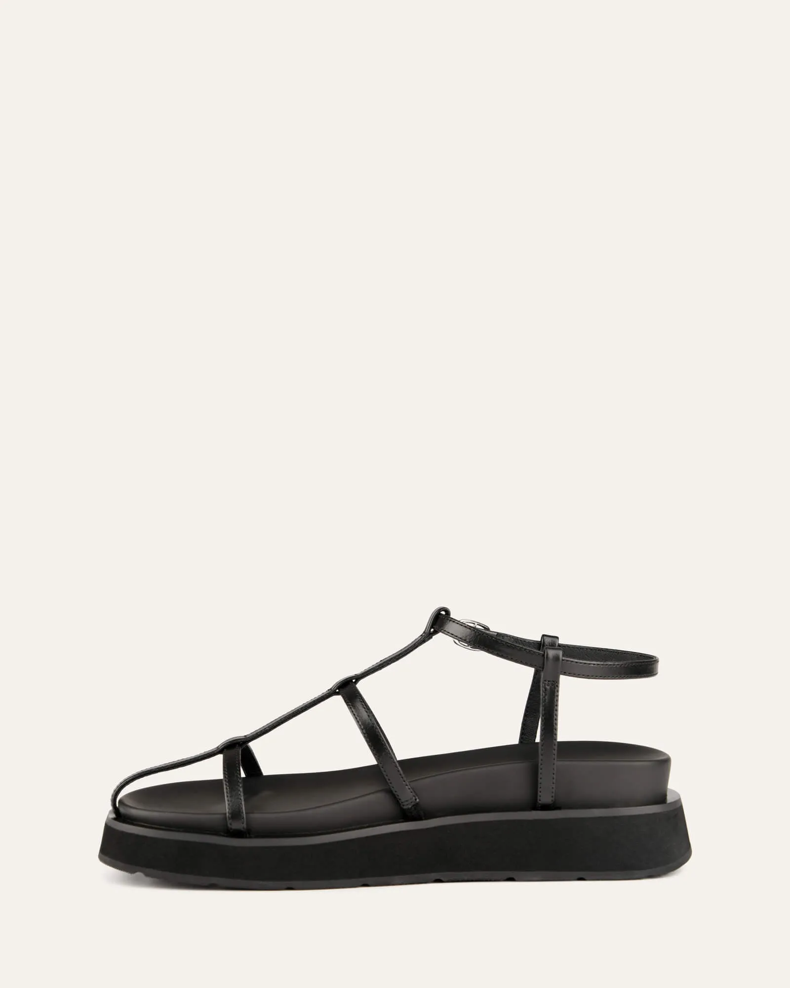 SANDALES PLATES MINA EN CUIR NOIR