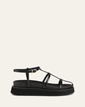 SANDALES PLATES MINA EN CUIR NOIR