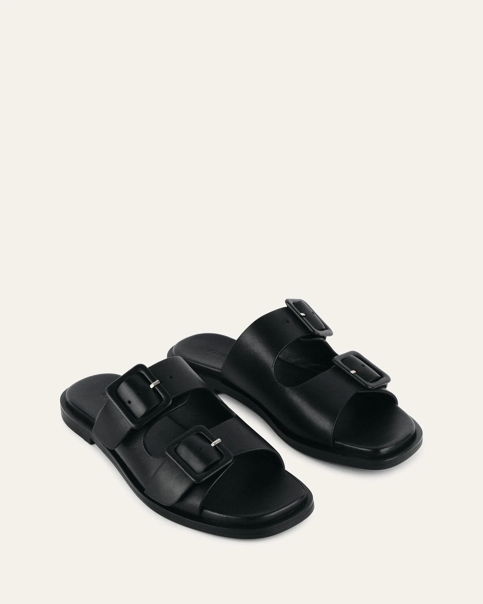 SEBASTIAN FLAT SLIDE EN CUIR NOIR